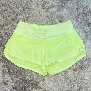 Speedup 2.5” shorts. Muted lime green. Size two. Well cared for. Discontinued.